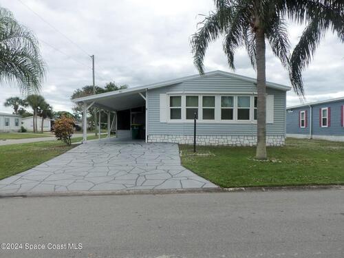 601 Marlin Circle  Barefoot Bay, FL 32976